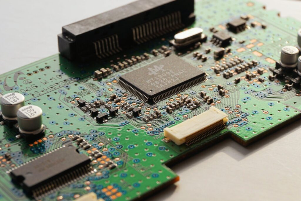 green black and white computer chip circuit